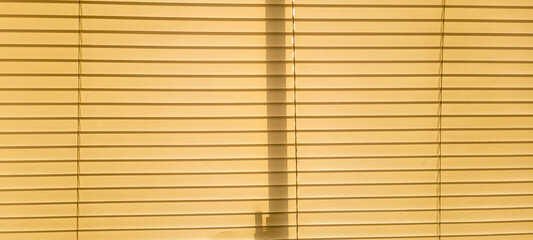 closed blind curtain on a sunny day in a house