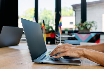 Devoted elegant man in casual business attire working in office.