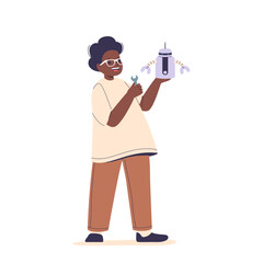 Student Joyfully Displays Creativity By Engaging In Robotics Workshop Holding A Small Robot And Wrench