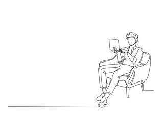 Continuous one line drawing of man siitting in cozy armchair working on laptop. Man is working in chair with a notebook single line art vector illustration. Editable vector.