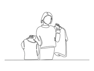 Continuous one line drawing of woman holding clothes on hangers. Shop assistant holding hangers with clothes single line draw vector illustration. Editable vector.