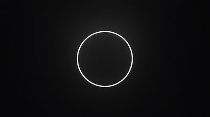 A minimalist black background with a thin, bright white circle outline at the center, emphasizing negative space and balance