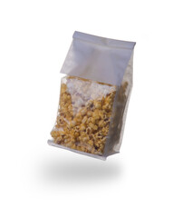 Plastic bag of popcorn on a white background