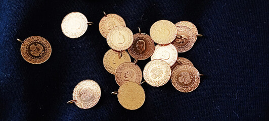 gold and bracelets on a white background,small gold