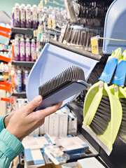 Brush and dustpan for cleaning in the store