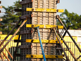 New construction site with beam frame to prepare reinforced concrete columns, foundation work and...