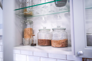 Collection of grain products in kitchen storage. Home kitchen lifestyle
