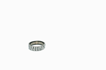 rustic wedding ring isolated on white background.