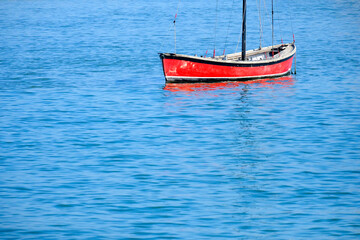 Red Sailboat Floating in Ocean Water Lake Boat Blue Sea