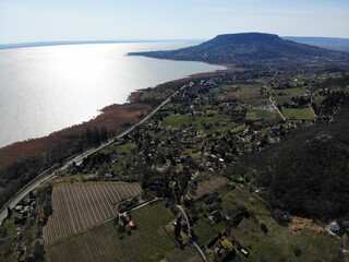 A photo of a view of a lake and a small town