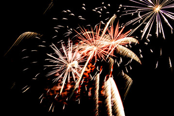 Fireworks lighting up the night sky. Pyrotechnics, abstract	