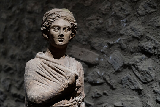 Ancient marble statue of a Roman woman, Pompeii Italy
