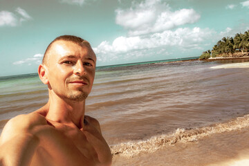 Male tourist Travelling man taking selfie Playa del Carmen Mexico.
