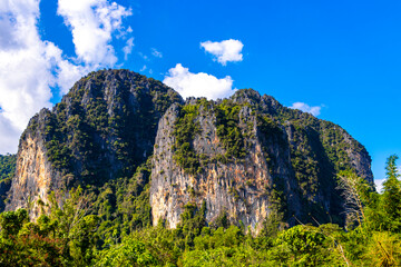 Mountain landscape with tropical jungle rocks in Vang Vieng Laos.
