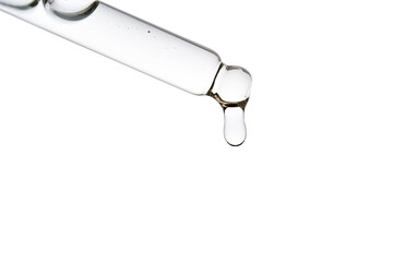 Dropper pipette with delicious serum with bubbles close-up.