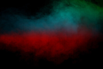 Blue and green steam on a black background.