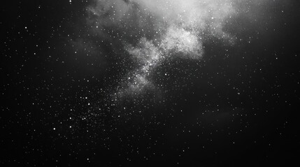 A dark night sky filled with stars and a cloud of white smoke.