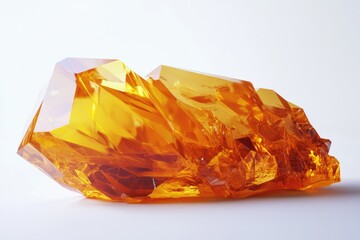 Yellow Crystal on White Surface