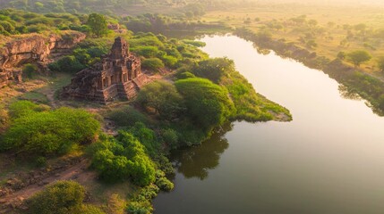Obraz premium Serene Sunset: Winding River and Ancient Temple | Reflective Waters and Historic Landmark in Nature's Splendor