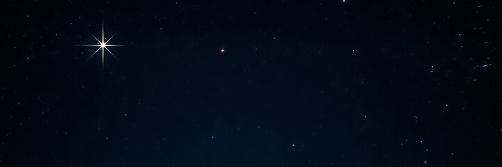 Fototapeta premium A vibrant and shining star illuminating the night sky, cosmic, night