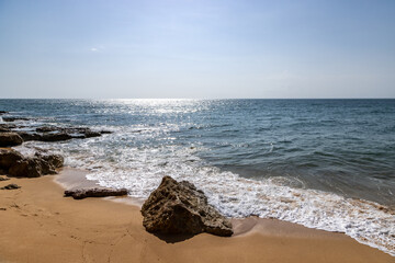 Looking out over the ocean from Praia dos Caneiros near Ferragudo on the Algarve coast