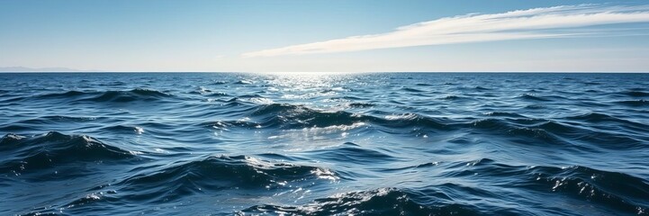 Fototapeta premium A serene ocean background with gentle waves and a clear blue sky, perfect for any design project, water, nature