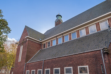 William the Silent Church (Willem de Zwijgerkerk), a church of the Dutch Reformed Church. In the 36 m high tower, a municipal clock was installed. Amsterdam, the Netherlands.