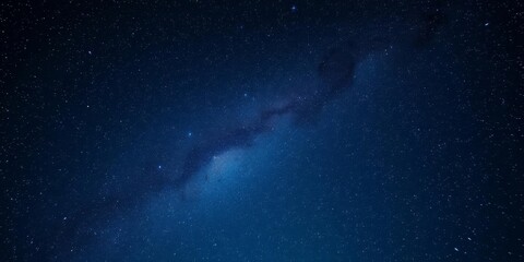 Fototapeta premium A close-up image of a shining star against a dark background, sparkle, magical
