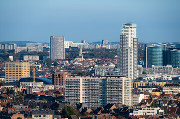 Obraz premium The Brussels skyline with the Up Site tower and residential apartment blocks in Koekelberg, Brussels Capital Region, Belgium, OCT 24, 2024