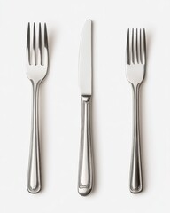 Stylishly Arrange Your Dining Table with Elegant Cutlery Including Forks and a Knife for a Sophisticated Experience