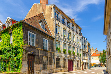 Fototapeta premium Besancon cityscape old town, La boucle de Besançon city historic centre, Rue de l'Orme de Chamars street with old houses medieval buildings in sunny summer day, Bourgogne-Franche-Comte region, France