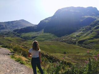 Naklejka premium person walking in the mountains