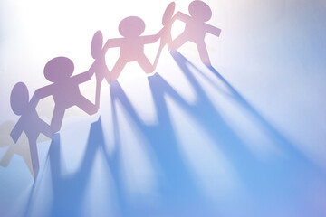 Team holding hands united