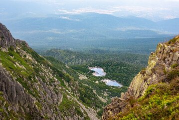 Sniezne Kotly in the Karkonosze Mountains, Poland, offers breathtaking views of rugged peaks and valleys