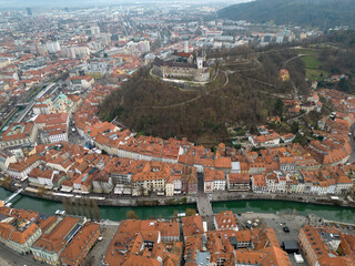 High altitude aerial view of Ljubljana old town with historic Ljubljanica riverfront and Cobblers'...