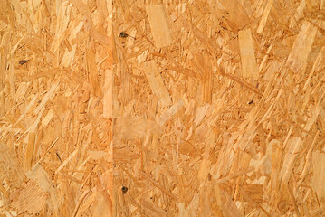 Tablero de conglomerado en puerta exterior soleado