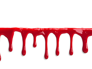 Red paint dripping isolated on white background	