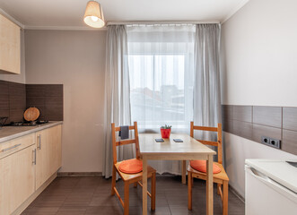 Classic Retro Home Kitchen Interior and Dining Table. Oven, Kettle, Windows. Dinning Table and Chairs. Minimalistic Interior Design. Window and Curtains