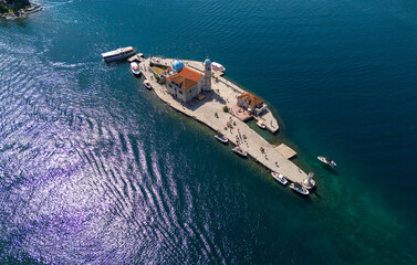 Beautiful coastal landmark of Montenegro, the Church of Our Lady of the Rocks surrounded by blue Adriatic waters