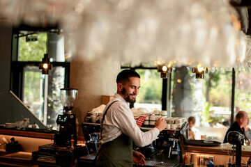 Barista crafting delicious espresso in a modern cafe, surrounded by vibrant greenery and cheerful patrons enjoying their daily brews