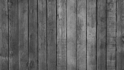 A wooden background with a few splinters. The wood is old and worn, giving the image a rustic and aged feel