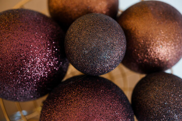 Glittery Decorative Ornaments in Warm Tones