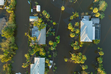 Aftermath of natural disaster. Flooded houses by hurricane Ian rainfall in Florida residential area