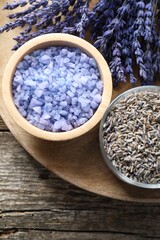 Natural sea salt and lavender on wooden table