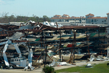 Boat station destroyed by hurricane wind in Florida coastal area. Consequences of natural disaster