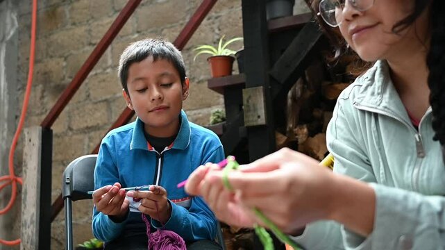 Mexican boy taking crochet classes