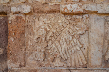 Pre-Hispanic stone engravings with animal figures in the archaeological zone of the pyramids of the Atlanteans, in Tula Hidalgo