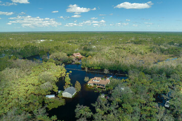 Heavy flood with high water surrounding residential houses after hurricane Ian rainfall in Florida...