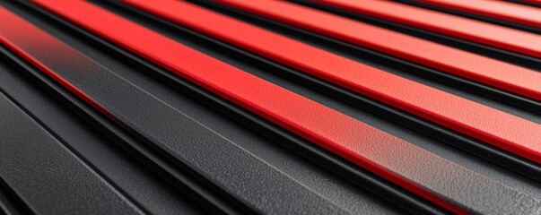 Obraz premium A close-up view of textured red and black stripes, creating a dynamic and modern visual pattern.