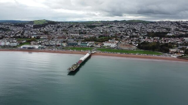 Paignton seafront and pier aerial picture looking towards Roundham head. Colourful and vibrant image. Torbay and English Riviera